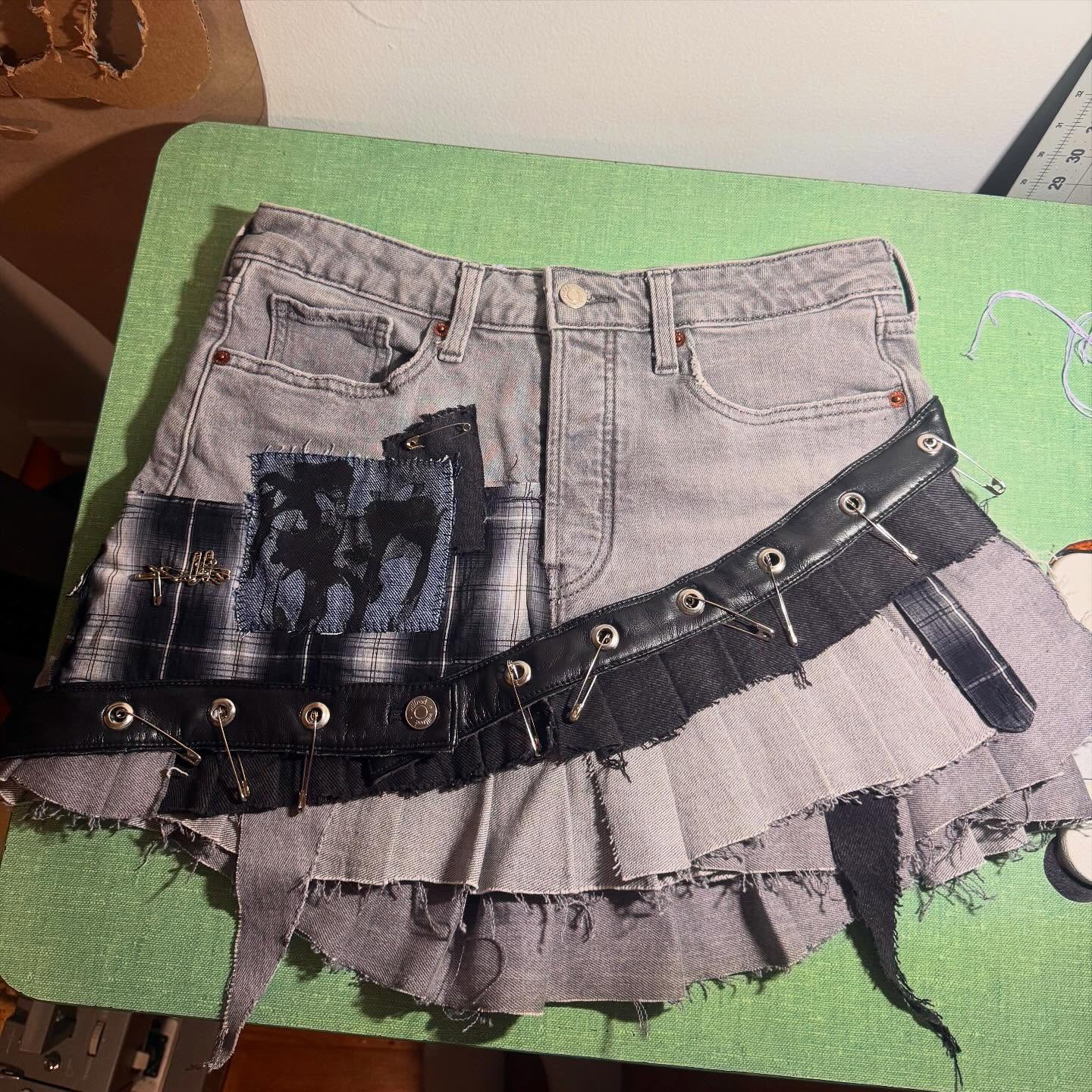 Denim pin skirt laid on a cutting mat